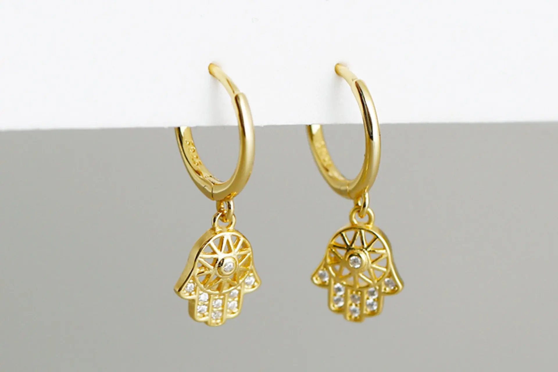 18K Gold Plated Hamsa Hand Cut Out Drop Earrings With White Zirconia Embellishment Primal Chakra
