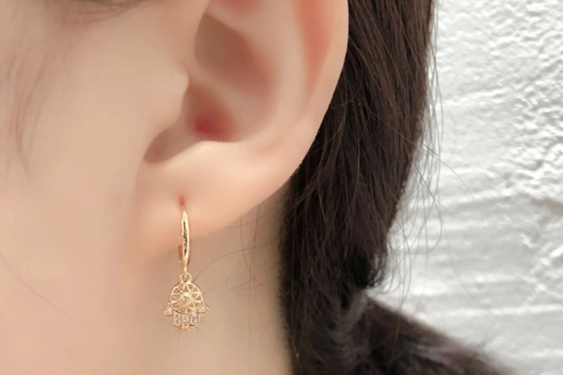 18K Gold Plated Hamsa Hand Cut Out Drop Earrings With White Zirconia Embellishment Primal Chakra
