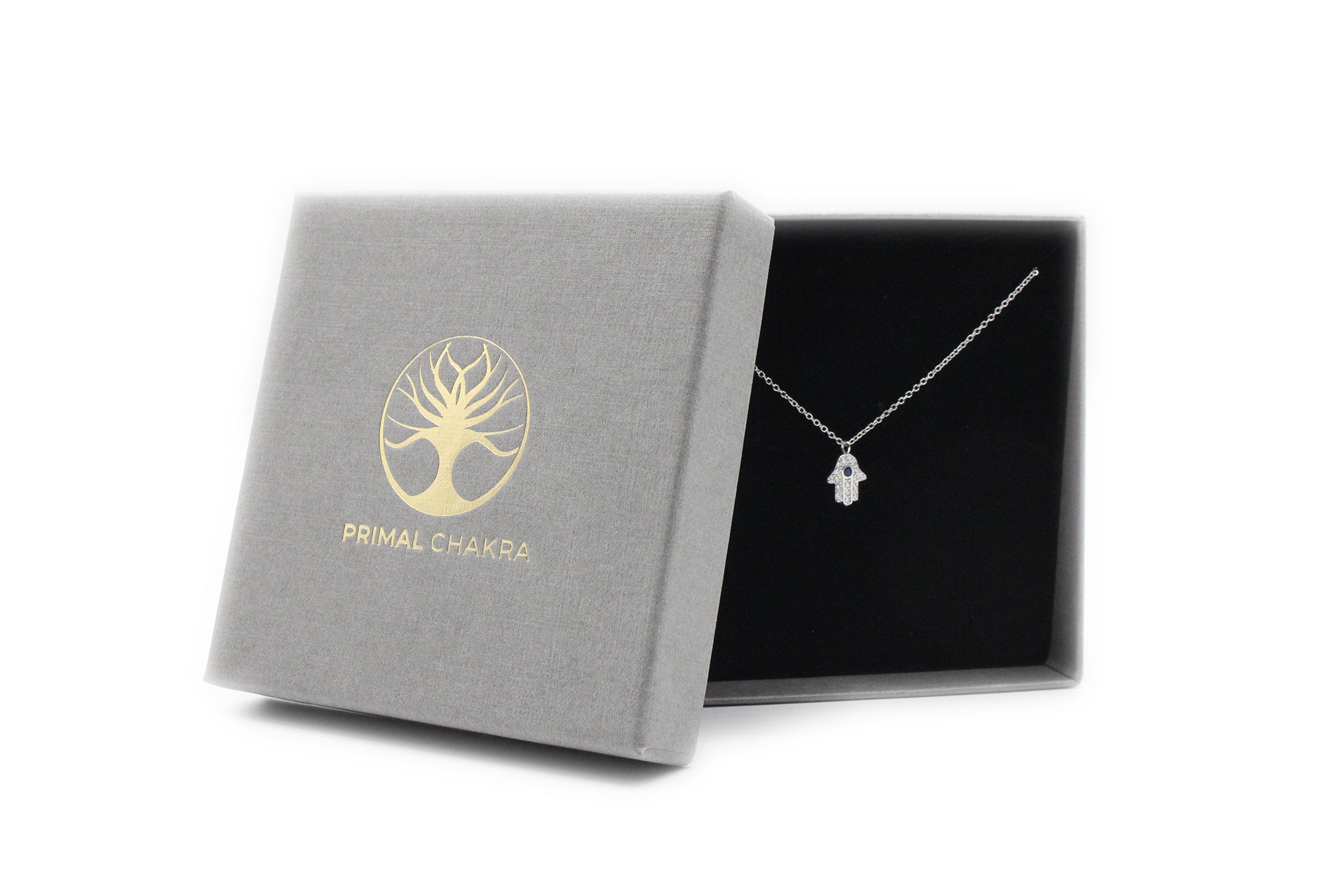 Platinum Plated Hamsa Necklace With Blue Cubic Zirconia and White Zirconia Embellishment Primal Chakra