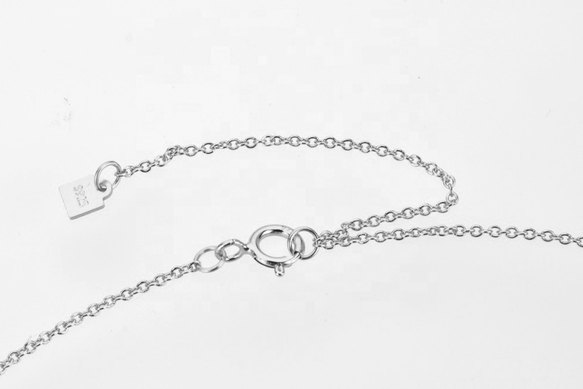 Platinum Plated Hamsa Necklace With Blue Cubic Zirconia and White Zirconia Embellishment Primal Chakra