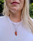 Gold Goldstone Angel Wing Pendant with a Silver Chain Primal Chakra