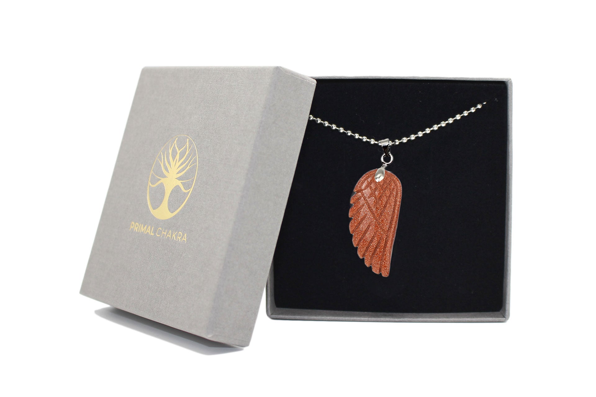 Gold Goldstone Angel Wing Pendant with a Silver Chain Primal Chakra