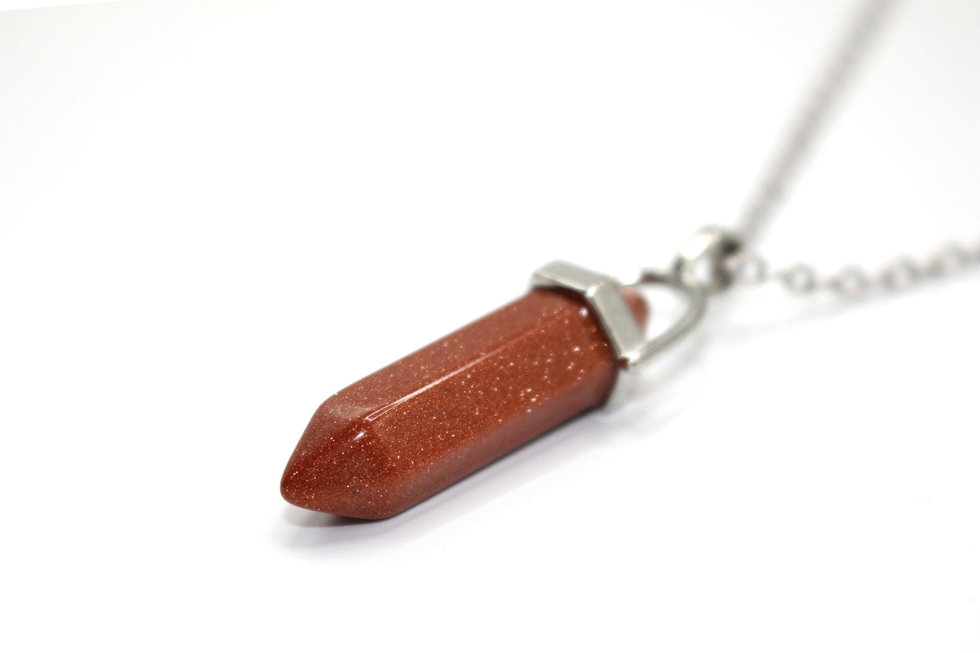 Brown Goldstone Contemporary Dagger Pendant with a Silver Chain Primal Chakra