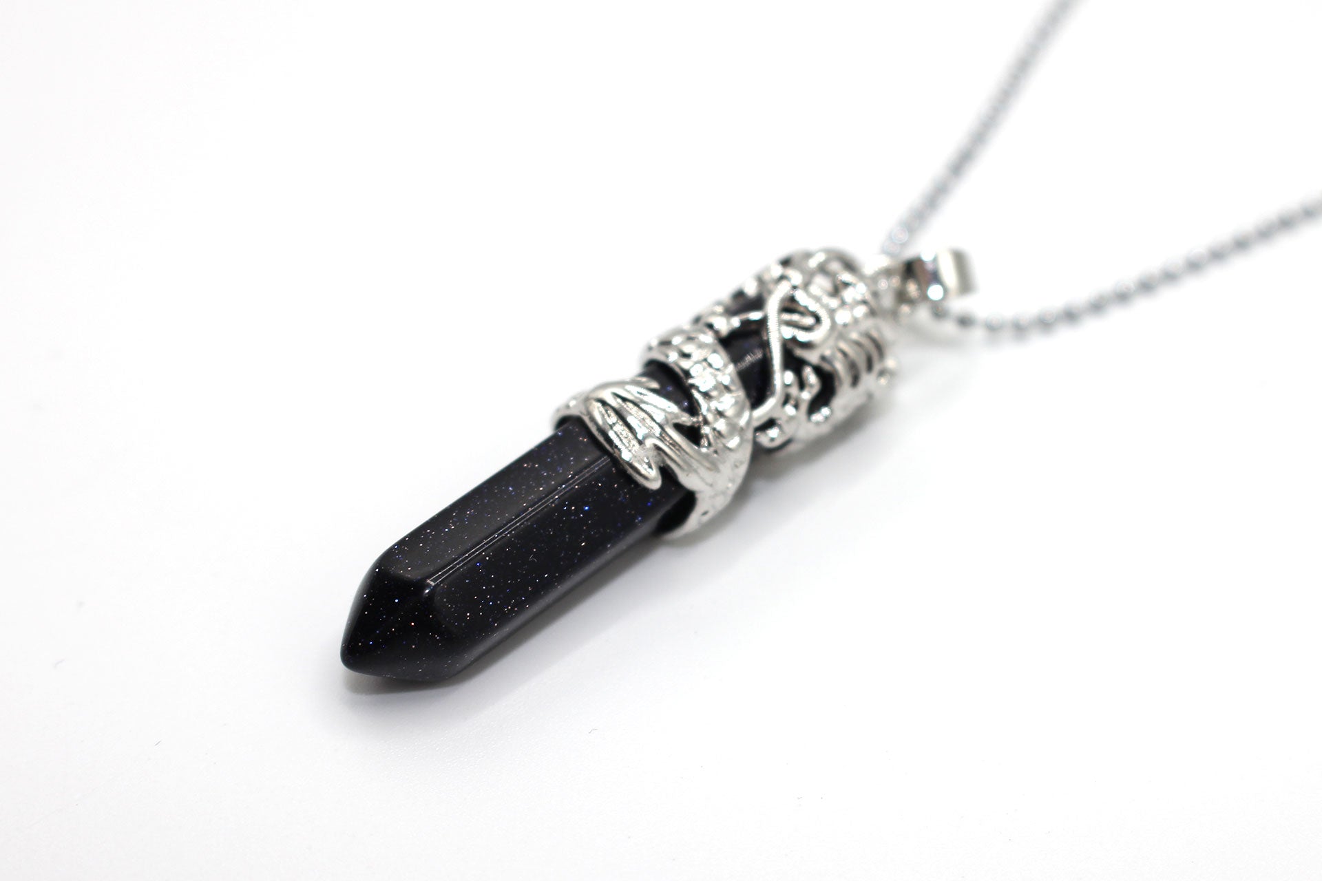 Blue Goldstone Dagger Pendant with a Silver Chain Primal Chakra
